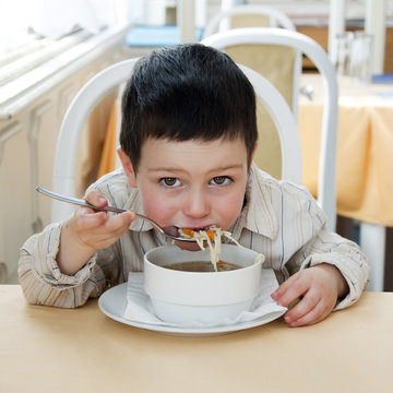 Child Eating Soup