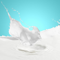 Obraz na płótnie Canvas Wylewanie mleka plusk
