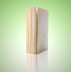 book isolated on green background