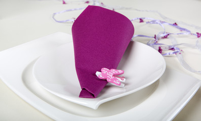 Element of table set decoration in purple