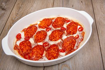 Tasty pizza prepared for baking