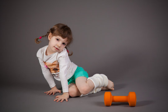little girl on gray background