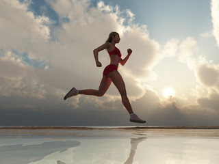 Fototapeta na wymiar Woman running on the beach