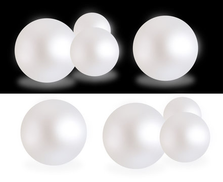 Pearls on white and black backgrounds
