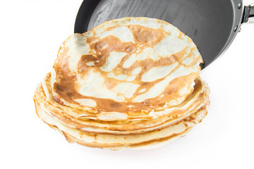 Pancakes from the frying pan on plate
