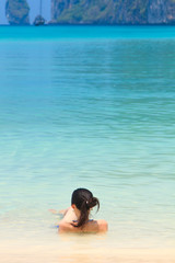 Young womand relaxing at the beach