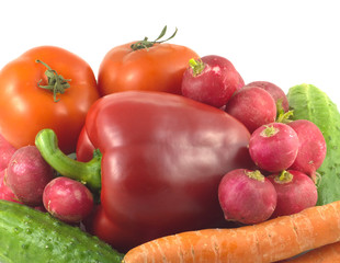 Assorted appetizing vegetables isolated over white closeup