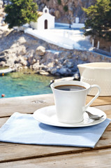 drinking coffee at a Greek island