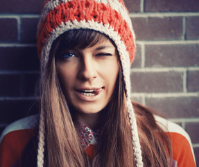 Outdoor winter portrait of young attractive teenage girl