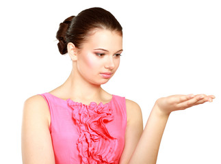 A young woman pointing at something