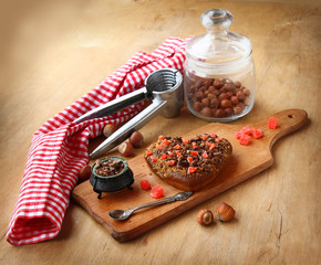 Chocolate baking cookies in form heart and hazel