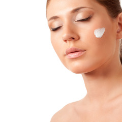 Obraz premium beautiful woman face with cream