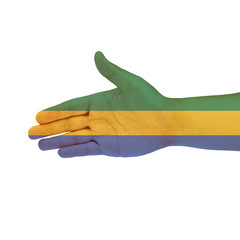 Gabon flag on hand isolated on white background
