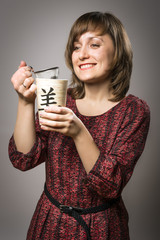 Woman prepares tea