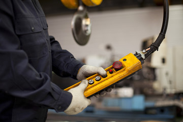 Factory interior crane hook button