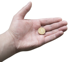 Десятирублевая монета в мужской ладони