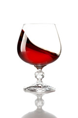 Splash of cognac in glass