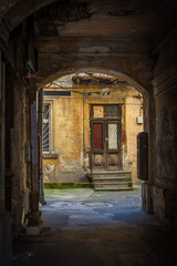 Fototapeta na wymiar Old dark gateway in Odessa, Ukraine