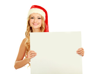 Beautiful christmas woman in santa hat holding
