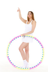 Woman with a hula-hoop. Fitness.