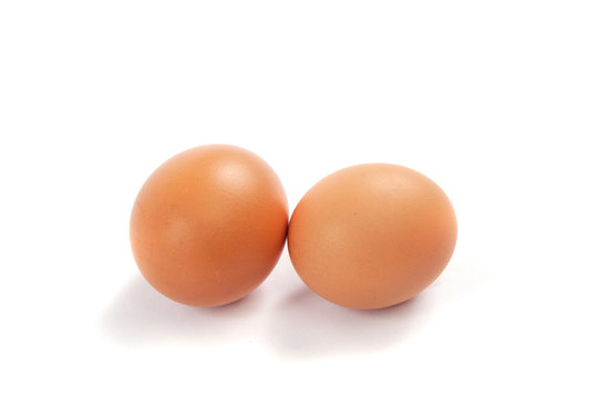 Brown eggs isolated on a white background.
