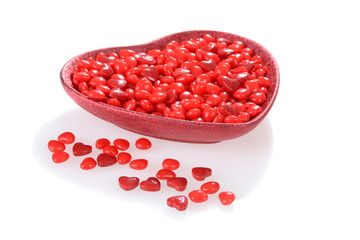 Valentines candy in a red heart bowl