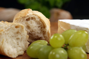 Cheese, bread and grapes