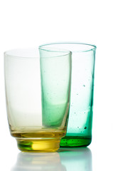 Two multi-colored vintage glasses
