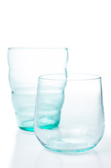 Two multi-colored vintage glasses