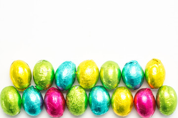Fototapeta na wymiar Colourful foil wrapped easter eggs