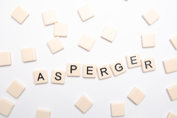 Asperger spelled out in letter pieces