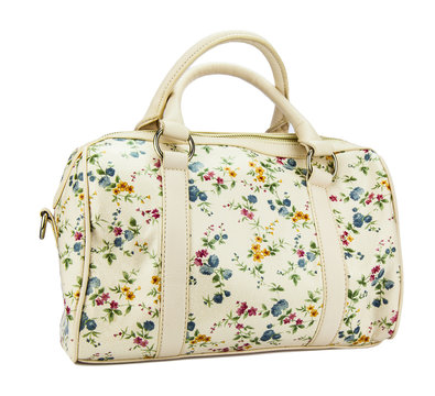 Modern handbag with foral design on white background