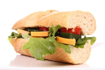 Sandwich with cheese, cucumber, tomato and lettuce