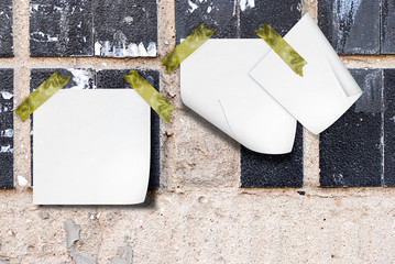 wall with a ceramic tile and notes paper