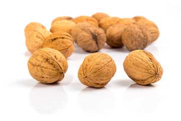 Walnuts close up over white background