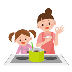 料理をする親子