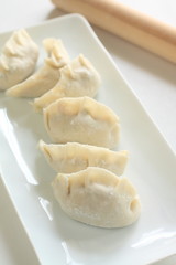 Fototapeta na wymiar prepared chinese dumpling, gyoza on dish