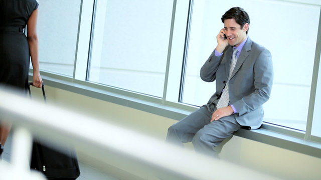 Caucasian Businessman Talking Smart Phone Airport Lounge