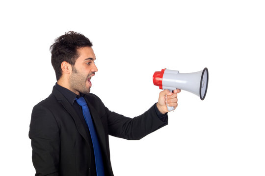 Young businessman with a Megaphone proclaiming something