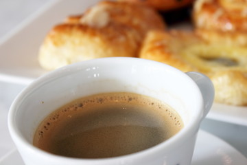 coffee cup  muffin and danish