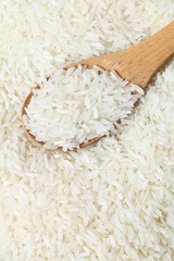 Rice with wooden spoon