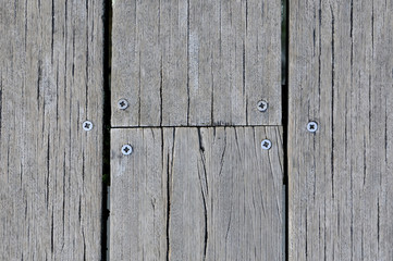 background texture of old wooden planks bolted