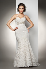 The beautiful young woman in a wedding dress