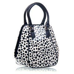 Fashion women handbag over white background