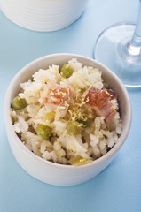 lemon rice with bacon and peas in a cup
