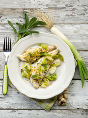 fish fillet with pistachio sage and leek