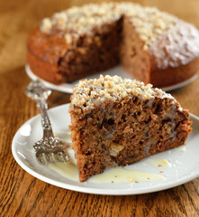 Walnut cake on a brown table