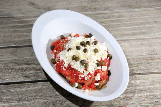 fresh tomato with cheese on a bread