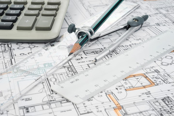 Architectural project, pair of compasses, rulers and calculator