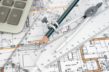 Architectural project, pair of compasses, rulers and calculator